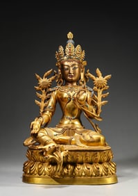 A GILT-BRONZE FIGURE OF TARA