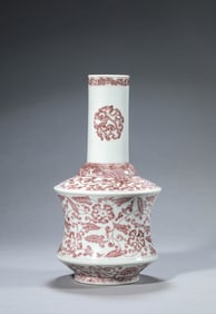 AN UNDERGLAZE-RED 'INTERLOCKING FLOWERS' YIAOLING JAR