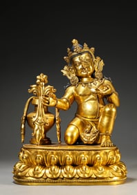 A GILT-BRONZE FIGURE OF BUDDHA