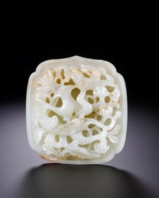 A WHITE JADE 'DRAGON' PLAQUE