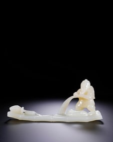 A JADE 'FISHERMAN'S GAIN' CARVING