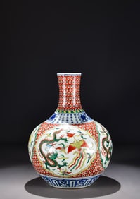 A WUCAI 'DRAGON AND PHOENIX' GLOBULAR VASE