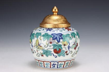 A DOUCAI 'MELON AND BUTTERFLY' JAR