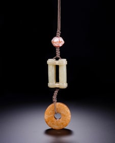 A MULTI-TREASURE NECKLACE