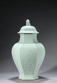 A PALE CELADON GLAZED 'LONGEVITY' HEXAGONAL COVERED JAR