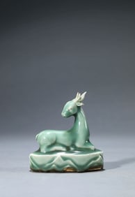 A CELADON DEER FORM PAPERWEIGHT