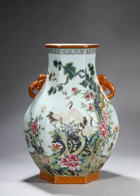 A FAMILLE ROSE 'PINE AND CRANE' VASE