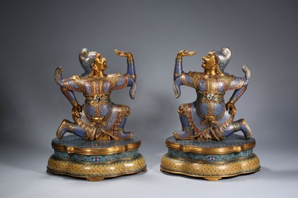 A PAIR OF CLOISONNé ENAMEL FOREIGNER FIGURES