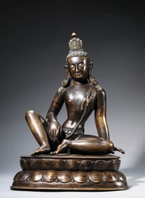 A TIBETAN GUGE STYLE SILVER INLAID ALLOY COPPER FIGURE OF RELAXED AVALOKITESHVARA