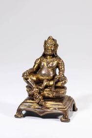 A TIBETAN PALA STYLE ALLOY COPPER FIGURE OF YELLOW JAMBHALA