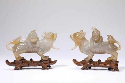 A GROUP OF AGATE 'CHILDREN AT PLAY' CARVINGS
