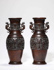 A PAIR OF WOODEN 'TAOTIE' VASES