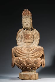 A WOODEN SEATED FIGURE OF GUANYIN