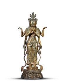 A GILT BRONZE FOUR ARMED AVALOKITESHVARA