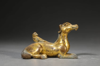 A GILT BRONZE ORNAMENT