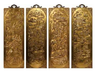 A GILT BRONZE 'CHILDREN AT PLAY' WALL PANEL