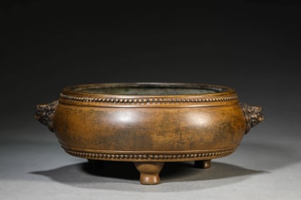 A BRONZE 'LION' CENSER