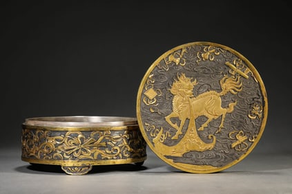 A GILT SILVER 'KIRIN AND EIGHT TREASURES' COVERED BOX