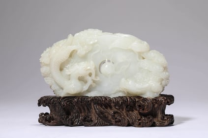 A JADE BI WITH 'DRAGON AND PHOENIX' DECORATION