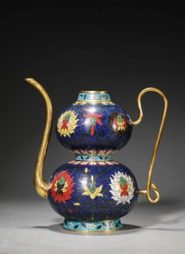 A CLOISONNé ENAMEL 'FLORAL' EWER