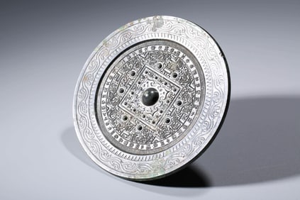 A BRONZE 'SHANFANG' MIRROR WITH ANIMALS AND ANTIQUARIAN MOTIFS