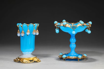 A GROUP OF GLASS OBJECTS