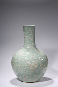 A PALE CELADON GROUND 'BUTTERFLY-AND-FLOWER' GLOBULAR VASE
