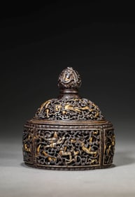A TIBETAN IRON AND GOLD TEMPLE MASTER'S RELIQUARY SET