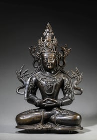 A TIBETAN PALA-STYLE GOLD-AND-SILVER-INLAID ALLOY COPPER FIGURE OF AMITAYUS