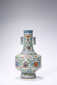 A DOUCAI 'INTERLOCKING FLOWERS AND EIGHT TREASURES' VASE