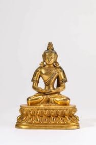 A GILT-BRONZE FIGURE OF AMITAYUS