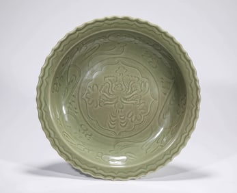 A LONGQUAN CELADON 'CARVED FLORAL' DISH