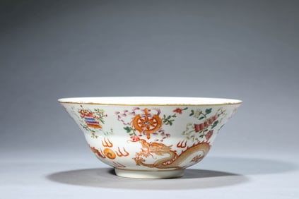 A FAMILLE-ROSE 'EIGHT TREASURES AND DRAGON' BOWL
