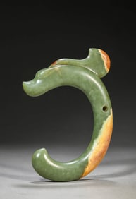 A JADE C-SHAPED DRAGON