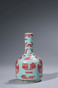 A TURQUOISE-GROUND IRON-RED GLAZED JAR
