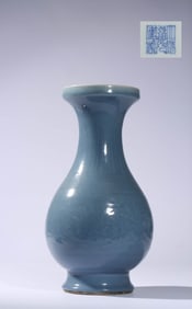 A CELADON GLAZED VASE