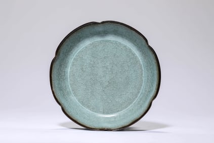 A CELADON GLAZED DISH