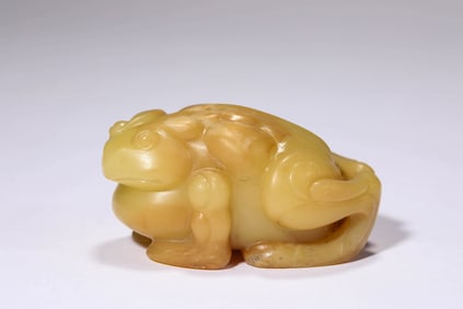 A YELLOW JADE TOAD