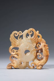 A JADE BI WITH 'DRAGON-AND-PHOENIX' DECORATION