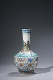 A DOUCAI 'EIGHT TREASURES' VASE
