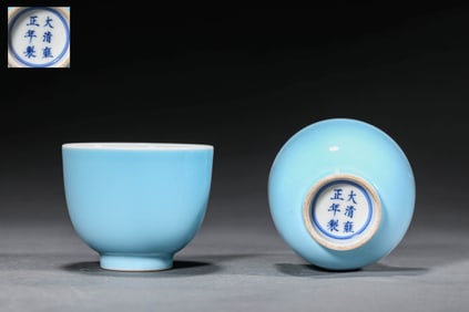 A PAIR OF SKY-BLUE-GLAZED TEACUPS