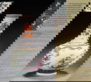 A WHITE-GROUND FAMILLE ROSE 'FIVE DRAGONS' VASE