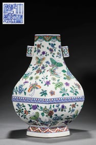 A DOUCAI 'BUTTERFLIES AND FLOWERS' HEXAGONAL VASE