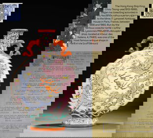 A LOW-RELIEF FAMILLE ROSE 'TWO DRAGONS' MOONFLASK