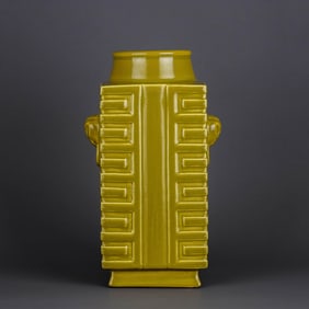 A YELLOW-GLAZED CONG-FORM VASE