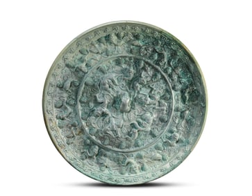 A BRONZE MIRROR