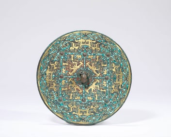 A GOLD-INLAID BRONZE MIRROR WITH TURQUOISE