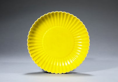 A LEMON-YELLOW GLAZED CHRYSANTHEMUM-FORM DISH