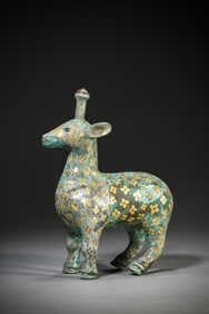A GOLD-INLAID BRONZE DEER