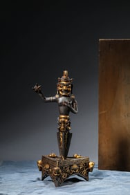 A TIBETAN IRON AND GOLD TEMPLE RITUAL PHURBA